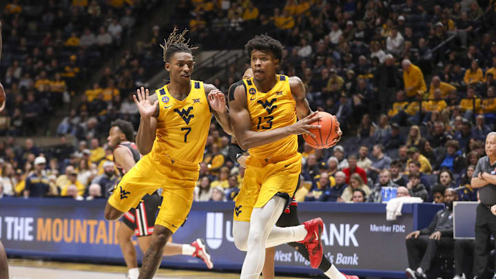 Jan 29, 2025; Morgantown, West Virginia, USA; West Virginia Mountaineers forward Amani Hansberry (13) steals a pass during the second half against the Houston Cougars at WVU Coliseum. Mandatory Credit: Ben Queen-Imagn Images Jan 29, 2025; Morgantown, West Virginia, USA; West Virginia Mountaineers forward Amani Hansberry (13) steals a pass during the second half against the Houston Cougars at WVU Coliseum. Mandatory Credit: Ben Queen-Imagn Images