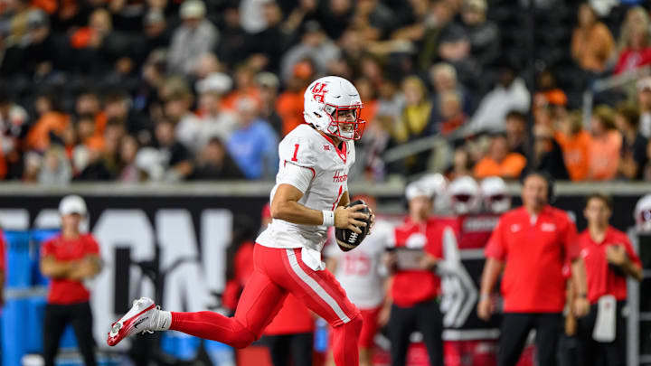 Sep 26, 2025; Corvallis, Oregon, USA; Houston Cougars quarterback Conner Weigman (1) runs the ball during the second quarter against the Oregon State Beavers at Reser Stadium. Mandatory Credit: Craig Strobeck-Imagn Images