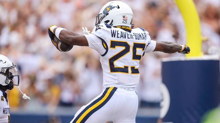 Sep 5, 2026; Morgantown, West Virginia, USA; West Virginia Mountaineers wide receiver Armoni Weaver-Bomar (25) celebrates after catching a pass for a touchdown during the first quarter against the Coastal Carolina Chanticleers at Milan Puskar Stadium. Mandatory Credit: Ben Queen-Imagn Images Sep 5, 2026; Morgantown, West Virginia, USA; West Virginia Mountaineers wide receiver Armoni Weaver-Bomar (25) celebrates after catching a pass for a touchdown during the first quarter against the Coastal Carolina Chanticleers at Milan Puskar Stadium. Mandatory Credit: Ben Queen-Imagn Images