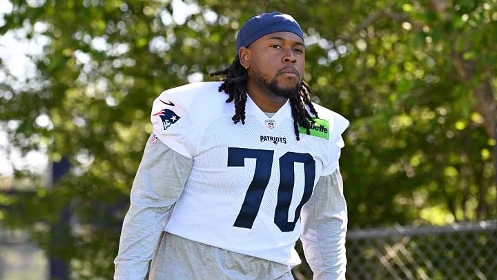 Jul 23, 2025; Foxborough, MA, USA; New England Patriots offensive tackle Caedan Wallace (70) walks to the practice field for training camp at Gillette Stadium. Mandatory Credit: Eric Canha-Imagn Images Jul 23, 2025; Foxborough, MA, USA; New England Patriots offensive tackle Caedan Wallace (70) walks to the practice field for training camp at Gillette Stadium. Mandatory Credit: Eric Canha-Imagn Images
