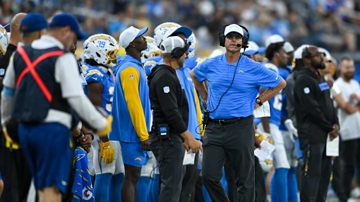 Aug 10, 2024; Inglewood, California, USA; Los Angeles Chargers head coach Jim Harbaugh on the sidelines against the Seattle Seahawks during the fourth quarter at SoFi Stadium. Mandatory Credit: Jonathan Hui-Imagn Images