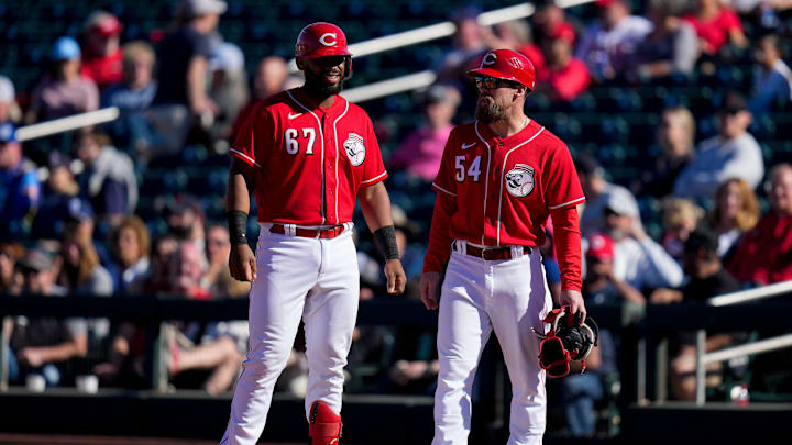Cincinnati Reds catcher Chuckie Robinson (67) stands at first with first base coach Collin Cowgill (54) after reaching on a bunt in the eighth inning of the MLB Cactus League spring training game between the Cincinnati Reds and the Cleveland Guardians at Goodyear Ballpark in Goodyear, Ariz., on Saturday, Feb. 25, 2023.
Cleveland Guardians At Cincinnati Reds Spring Training Cincinnati Reds catcher Chuckie Robinson (67) stands at first with first base coach Collin Cowgill (54) after reaching on a bunt in the eighth inning of the MLB Cactus League spring training game between the Cincinnati Reds and the Cleveland Guardians at Goodyear Ballpark in Goodyear, Ariz., on Saturday, Feb. 25, 2023.
Cleveland Guardians At Cincinnati Reds Spring Training