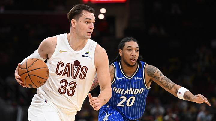 Oct 11, 2026; Cleveland, Ohio, USA; Cleveland Cavaliers forward Mario Hezonja (33) drives to the basket against Orlando Magic guard JD Davison (20) during the second half at Rocket Arena. Mandatory Credit: Ken Blaze-Imagn Images Oct 11, 2026; Cleveland, Ohio, USA; Cleveland Cavaliers forward Mario Hezonja (33) drives to the basket against Orlando Magic guard JD Davison (20) during the second half at Rocket Arena. Mandatory Credit: Ken Blaze-Imagn Images