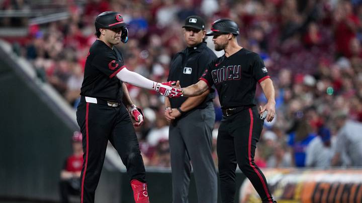 Sep 18, 2026; Cincinnati, Ohio, USA; Cincinnati Reds first baseman Sal Stewart (27) high-fives first base coach Collin Cowgill (54) after hitting a single against the Chicago Cubs in the seventh inning at Great American Ball Park. Mandatory Credit: Aaron Doster-Imagn Images Sep 18, 2026; Cincinnati, Ohio, USA; Cincinnati Reds first baseman Sal Stewart (27) high-fives first base coach Collin Cowgill (54) after hitting a single against the Chicago Cubs in the seventh inning at Great American Ball Park. Mandatory Credit: Aaron Doster-Imagn Images