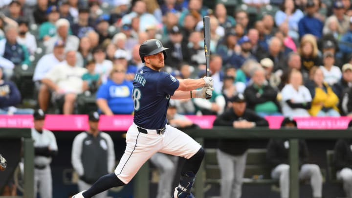 Seattle Mariners designated hitter Mitch Garver (18) hits an RBI double against the Chicago White Sox during the second inning at T-Mobile Park on June 11.