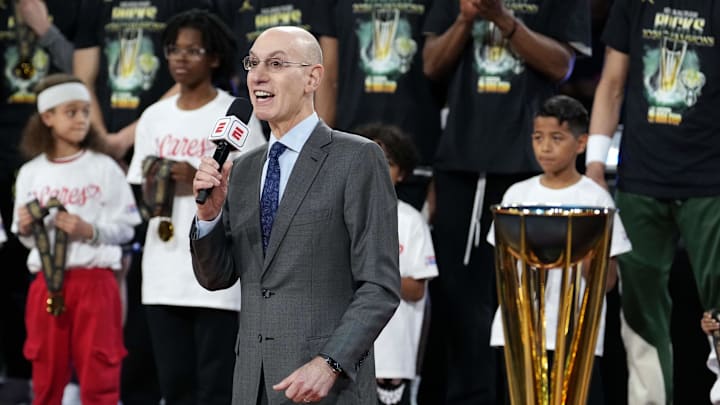 Dec 17, 2024; Las Vegas, Nevada, USA; NBA commissioner Adam Silver presents the trophy to the Milwaukee Bucks after they won the Emirates NBA Cup championship game against the Oklahoma City Thunder at T-Mobile Arena. Mandatory Credit: Kyle Terada-Imagn Images