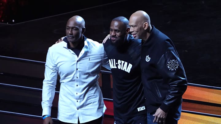 Feb 19, 2023; Salt Lake City, UT, USA; Kareem Abdul-Jabbar (right), Lebron James (center) and Karl