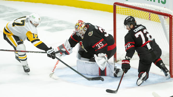Dec 14, 2024; Ottawa, Ontario, CAN; Pittsburgh Penguins right wing Brian Rust (17) shoots on Ottawa Senators goalie Linus Ullmark (35) in overtime at the Canadian Tire Centre. Mandatory Credit: Marc DesRosiers-Imagn Images Dec 14, 2024; Ottawa, Ontario, CAN; Pittsburgh Penguins right wing Brian Rust (17) shoots on Ottawa Senators goalie Linus Ullmark (35) in overtime at the Canadian Tire Centre. Mandatory Credit: Marc DesRosiers-Imagn Images