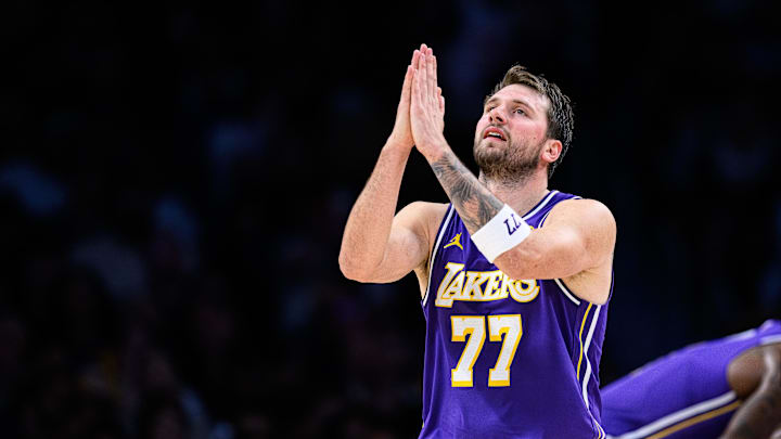 Mar 27, 2026; Los Angeles, California, USA; Los Angeles Lakers guard Luka Doncic (77) gestures during the second half against the Brooklyn Nets at Crypto.com Arena. Mandatory Credit: William Liang-Imagn Images