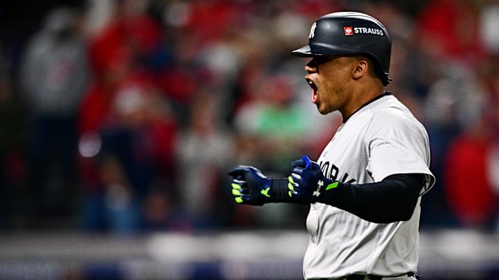 New York Yankees outfielder Juan Soto (22) celebrates after hitting a three run home run during the tenth inning against the Cleveland Guardians during game five of the ALCS for the 2024 MLB playoffs at Progressive Field on Oct 19. New York Yankees outfielder Juan Soto (22) celebrates after hitting a three run home run during the tenth inning against the Cleveland Guardians during game five of the ALCS for the 2024 MLB playoffs at Progressive Field on Oct 19.