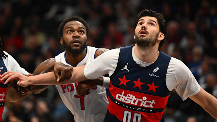 Mar 19, 2026; Washington, District of Columbia, USA; Washington Wizards forward Tristan Vukcevic (00) boxes out Detroit Pistons forward Paul Reed (7) during the first half at Capital One Arena. Mandatory Credit: Brad Mills-Imagn Images