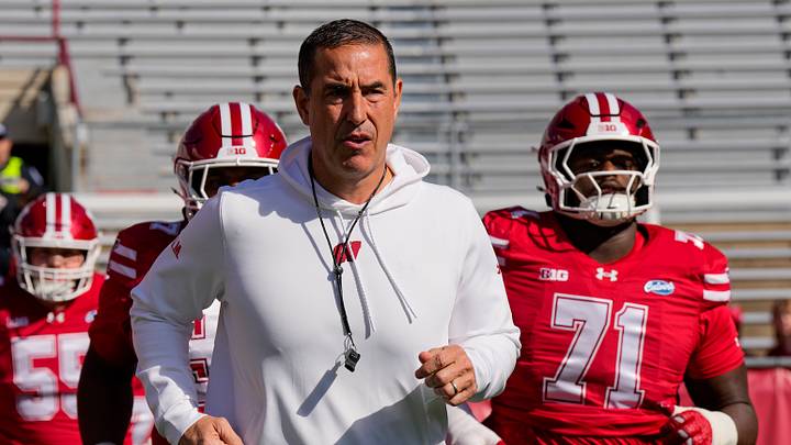 Oct 3, 2026; Madison, Wisconsin, USA;  Wisconsin Badgers head coach Luke Fickell leads the team onto the field for warmups prior to the game against the Michigan State Spartans at Camp Randall Stadium. Mandatory Credit: Jeff Hanisch-Imagn Images
