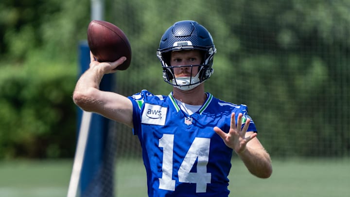 Jun 11, 2025; Renton, WA, USA; Seattle Seahawks quarterback Sam Darnold (14) passes the ball during mini-camp at Virginia Mason Athletic Center. Mandatory Credit: Stephen Brashear-Imagn Images