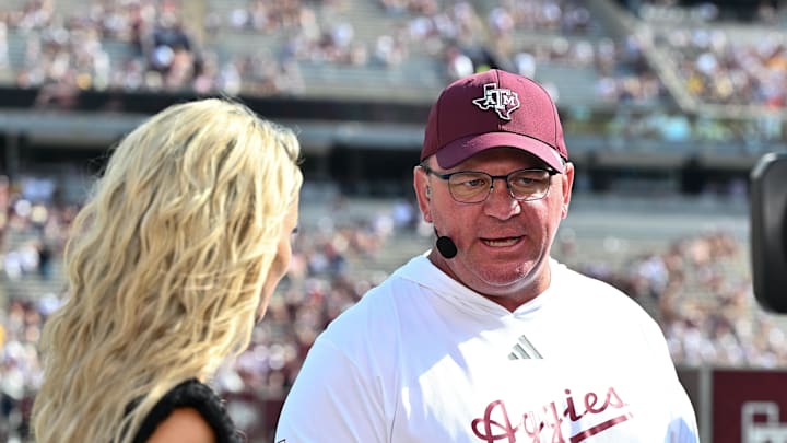Oct 5, 2024; College Station, Texas, USA; SEC Nation host Laura speaks with Texas A&M Aggies head coach Mike Elko prior to the game between the Texas A&M Aggies and the Missouri Tigers at Kyle Field. Mandatory Credit: Maria Lysaker-Imagn Images. 