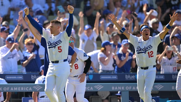 Aug 31, 2025; Los Angeles, California, USA; Los Angeles Dodgers first baseman Freddie Freeman (5), left fielder Enrique Hernandez (8) and right fielder Alex Call (12) celebrate after catcher Will Smith (16) hit a walk-off home run in the ninth inning against the Arizona Diamondbacks at Dodger Stadium. Mandatory Credit: Jayne Kamin-Oncea-Imagn Images Aug 31, 2025; Los Angeles, California, USA; Los Angeles Dodgers first baseman Freddie Freeman (5), left fielder Enrique Hernandez (8) and right fielder Alex Call (12) celebrate after catcher Will Smith (16) hit a walk-off home run in the ninth inning against the Arizona Diamondbacks at Dodger Stadium. Mandatory Credit: Jayne Kamin-Oncea-Imagn Images