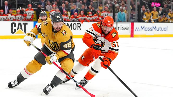 May 12, 2026; Las Vegas, Nevada, USA; Anaheim Ducks left wing Cutter Gauthier (61) sweeps the puck away from Vegas Golden Knights center Tomas Hertl (48) during the first period of game five of the second round of the 2026 Stanley Cup Playoffs at T-Mobile Arena. Mandatory Credit: Stephen R. Sylvanie-Imagn Images May 12, 2026; Las Vegas, Nevada, USA; Anaheim Ducks left wing Cutter Gauthier (61) sweeps the puck away from Vegas Golden Knights center Tomas Hertl (48) during the first period of game five of the second round of the 2026 Stanley Cup Playoffs at T-Mobile Arena. Mandatory Credit: Stephen R. Sylvanie-Imagn Images