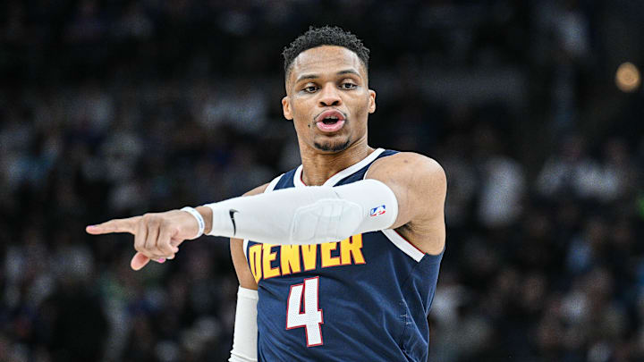 Jan 25, 2025; Minneapolis, Minnesota, USA; Denver Nuggets guard Russell Westbrook (4) reacts during the third quarter against the Minnesota Timberwolves at Target Center. Mandatory Credit: Jeffrey Becker-Imagn Images