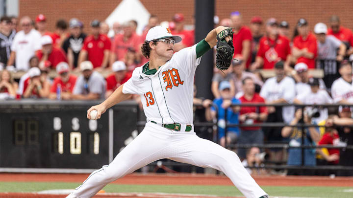 Miami pitcher Griffin Hugus winds up during the NCAA baseball Super Regional game 2 at Jim Patterson Stadium on June 7, 2025 in Louisville, Ky.