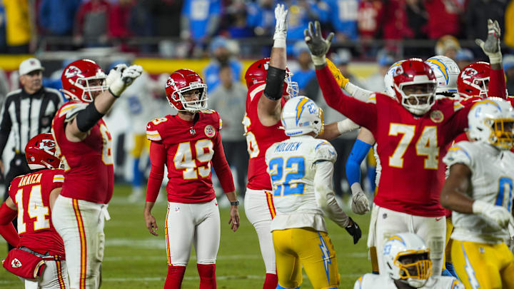 Dec 8, 2024; Kansas City, Missouri, USA; Kansas City Chiefs place kicker Matthew Wright (49) watches a game winning field goal as time expires against the Los Angeles Chargers at GEHA Field at Arrowhead Stadium. Mandatory Credit: Jay Biggerstaff-Imagn Images Dec 8, 2024; Kansas City, Missouri, USA; Kansas City Chiefs place kicker Matthew Wright (49) watches a game winning field goal as time expires against the Los Angeles Chargers at GEHA Field at Arrowhead Stadium. Mandatory Credit: Jay Biggerstaff-Imagn Images