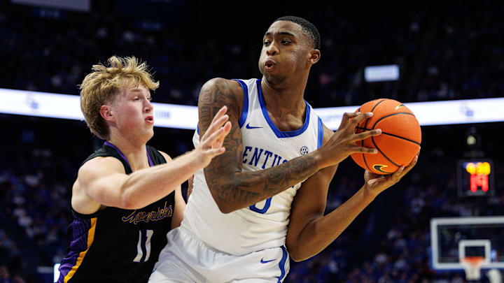 Oct 29, 2024; Lexington, KY, USA; Kentucky Wildcats forward Brandon Garrison (10) handles the ball around Minnesota State Mavericks forward Caden Kirkman (11) during the second half at Rupp Arena. Mandatory Credit: Jordan Prather-Imagn Images