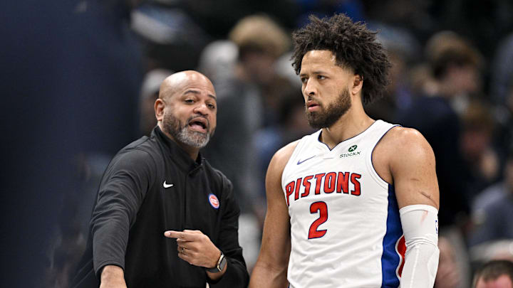 Dec 18, 2025; Dallas, Texas, USA; Detroit Pistons head coach J.B. Bickerstaff talks with guard Cade Cunningham (2) during the first quarter against the Dallas Mavericks at the American Airlines Center. Mandatory Credit: Jerome Miron-Imagn Images