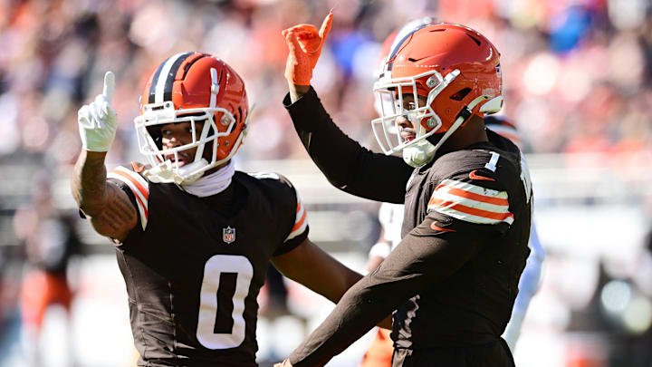 Oct 27, 2024; Cleveland, Ohio, USA; Cleveland Browns cornerback Greg Newsome II (0) and safety Juan Thornhill (1) celebrate after a pass break up during the first half against the Baltimore Ravens at Huntington Bank Field. Mandatory Credit: Ken Blaze-Imagn Images
