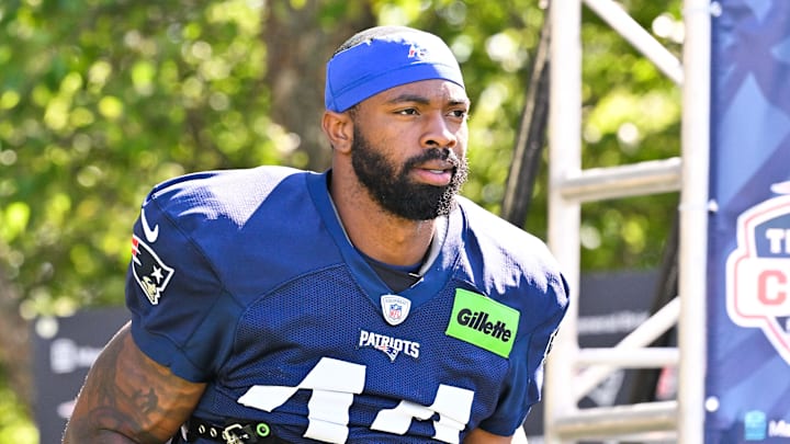 Jul 28, 2025; Foxborough, MA, USA; New England Patriots linebacker K'Lavon Chaisson (44) heads to the practice fields for training camp at Gillette Stadium. Mandatory Credit: Eric Canha-Imagn Images