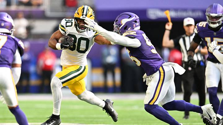 Sep 13, 2026; Minneapolis, Minnesota, USA; Minnesota Vikings linebacker Eric Wilson (55) attempts to tackle Green Bay Packers running back Chris Brooks (30) during the first half at U.S. Bank Stadium. Mandatory Credit: Jeffrey Becker-Imagn Images Sep 13, 2026; Minneapolis, Minnesota, USA; Minnesota Vikings linebacker Eric Wilson (55) attempts to tackle Green Bay Packers running back Chris Brooks (30) during the first half at U.S. Bank Stadium. Mandatory Credit: Jeffrey Becker-Imagn Images