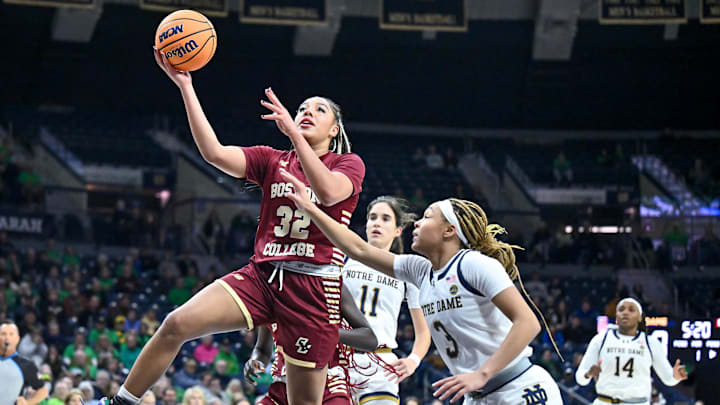 Jan 11, 2024; South Bend, Indiana, USA; Boston College Eagles forward Teya Sidberry (32) goes up for a shot as Notre Dame Fighting Irish guard Hannah Hidalgo (3) defends in the first half at the Purcell Pavilion. Mandatory Credit: Matt Cashore-Imagn Images