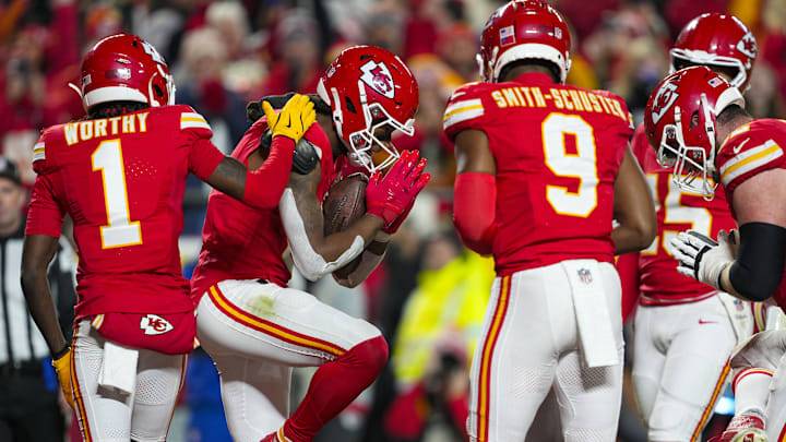 Dec 8, 2024; Kansas City, Missouri, USA; Kansas City Chiefs wide receiver DeAndre Hopkins (8) celebrates with teammate after scoring a touchdown during the first half against the Los Angeles Chargers at GEHA Field at Arrowhead Stadium. Mandatory Credit: Jay Biggerstaff-Imagn Images