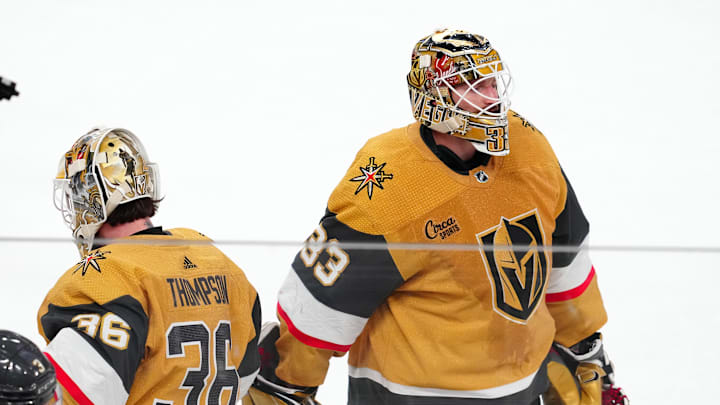 Feb 22, 2024; Las Vegas, Nevada, USA; Vegas Golden Knights goaltender Adin Hill (33) is replaced by Vegas Golden Knights goaltender Logan Thompson (36) after surrendering 3 goals against the Toronto Maple Leafs during the first period at T-Mobile Arena. Mandatory Credit: Stephen R. Sylvanie-Imagn Images Feb 22, 2024; Las Vegas, Nevada, USA; Vegas Golden Knights goaltender Adin Hill (33) is replaced by Vegas Golden Knights goaltender Logan Thompson (36) after surrendering 3 goals against the Toronto Maple Leafs during the first period at T-Mobile Arena. Mandatory Credit: Stephen R. Sylvanie-Imagn Images