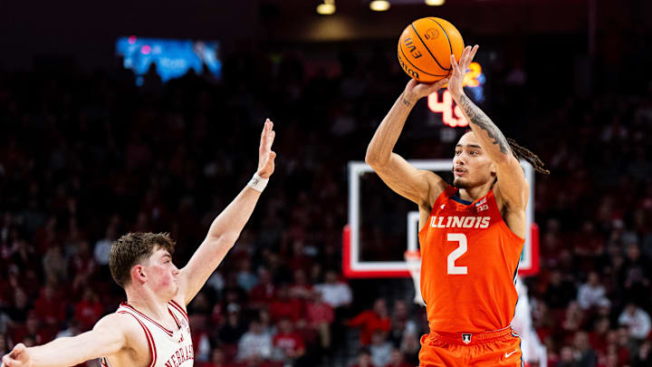 Former llinois Fighting Illini guard Dra Gibbs-Lawhorn (2) shoots a three-point shot against Nebraska Cornhuskers guard Connor Essegian (0) during the second half at Pinnacle Bank Arena. Former llinois Fighting Illini guard Dra Gibbs-Lawhorn (2) shoots a three-point shot against Nebraska Cornhuskers guard Connor Essegian (0) during the second half at Pinnacle Bank Arena.