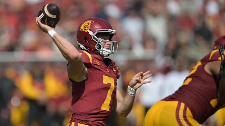 Oct 12, 2024; Los Angeles, California, USA; USC Trojans quarterback Miller Moss (7) throws a pass in the first half against the Penn State Nittany Lions United Airlines Field at Los Angeles Memorial Coliseum. Mandatory Credit: Jayne Kamin-Oncea-Imagn Images Oct 12, 2024; Los Angeles, California, USA; USC Trojans quarterback Miller Moss (7) throws a pass in the first half against the Penn State Nittany Lions United Airlines Field at Los Angeles Memorial Coliseum. Mandatory Credit: Jayne Kamin-Oncea-Imagn Images
