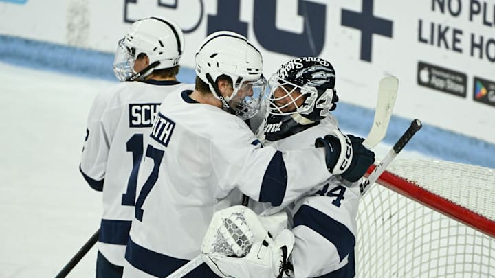 Blue Jackets prospect and Penn State defenseman Jackson Smith (7) celebrates a win over Clarkson with his teammates. Blue Jackets prospect and Penn State defenseman Jackson Smith (7) celebrates a win over Clarkson with his teammates.