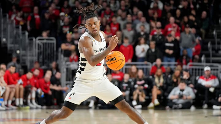 Cincinnati Bearcats guard Jizzle James (2) changes direction in the second half of a college basketball game against the Bradley Braves during a second-round game of the National Invitation Tournament,, Saturday, March 23, 2024, at Fifth Third Arena in Cincinnati. Cincinnati Bearcats guard Jizzle James (2) changes direction in the second half of a college basketball game against the Bradley Braves during a second-round game of the National Invitation Tournament,, Saturday, March 23, 2024, at Fifth Third Arena in Cincinnati.