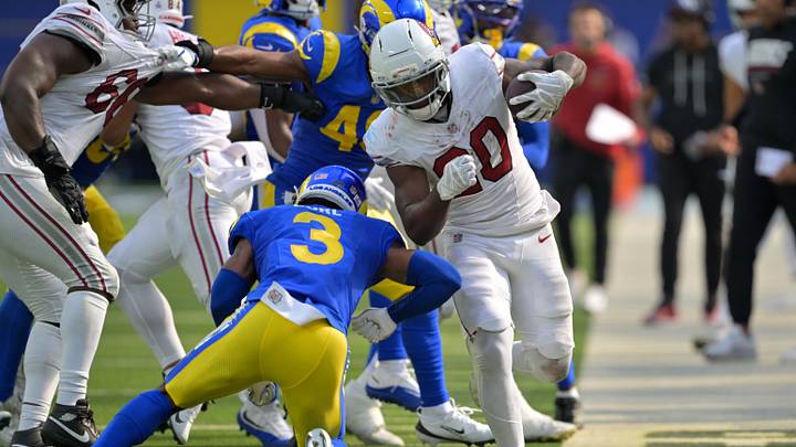 Oct 18, 2026; Inglewood, California, USA;  Arizona Cardinals running back Bam Knight (20) is forced out of bounds by Los Angeles Rams safety Kam Curl (3) in the third quarter at SoFi Stadium.  Mandatory Credit: Jayne Kamin-Oncea-Imagn Images