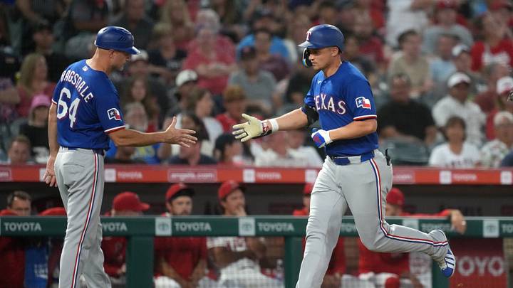 Texas Rangers shortstop Corey Seager (5) is congratulated by third base coach Corey Ragsdale (64) Credit: Kirby Lee-Imagn Images Texas Rangers shortstop Corey Seager (5) is congratulated by third base coach Corey Ragsdale (64) Credit: Kirby Lee-Imagn Images