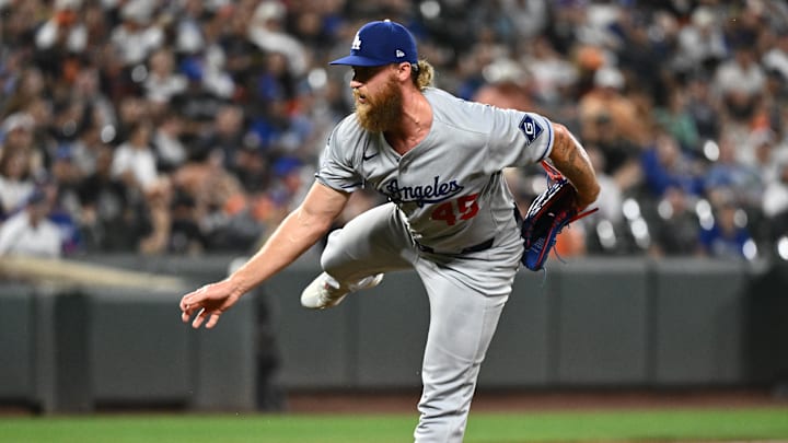 Sep 5, 2025; Baltimore, Maryland, USA;  Los Angeles Dodgers pitcher Michael Kopech (45) delivers a pitch during the eighth inning against the Baltimore Orioles at Oriole Park at Camden Yards. Mandatory Credit: James A. Pittman-Imagn Images