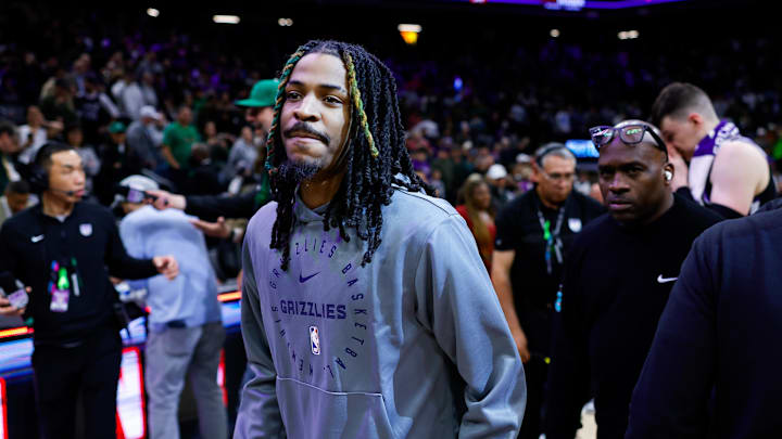 Mar 17, 2025; Sacramento, California, USA; Memphis Grizzlies guard Ja Morant (12) walks off the court after the game against the Sacramento Kings at Golden 1 Center. Mandatory Credit: Sergio Estrada-Imagn Images