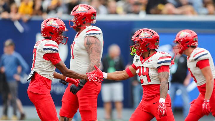 Oct 10, 2026; Morgantown, West Virginia, USA; Arizona Wildcats running back Quincy Craig (24) celebrates with wide receiver Isaiah Mizell (17) after running for a touchdown during the second quarter against the West Virginia Mountaineers at Milan Puskar Stadium. Oct 10, 2026; Morgantown, West Virginia, USA; Arizona Wildcats running back Quincy Craig (24) celebrates with wide receiver Isaiah Mizell (17) after running for a touchdown during the second quarter against the West Virginia Mountaineers at Milan Puskar Stadium.