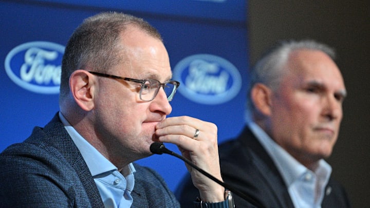 May 21, 2024; Toronto, Ontario, CANADA;  Toronto Maple Leafs general manager Brad Treliving listens to a question during a media conference to introduce new head coach Craig Berube (right) at Ford Performance Centre. Mandatory Credit: Dan Hamilton-Imagn Images