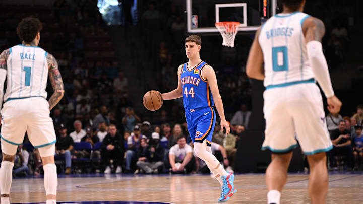 Oct 5, 2025; North Charleston, South Carolina, USA; Oklahoma City Thunder guard Nikola Topic (44) drives up the court against the Charlotte Hornets at North Charleston Coliseum. Mandatory Credit: Arthur Ellis-Imagn Images