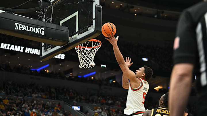 Mar 20, 2026; St. Louis, MO, USA; Miami (FL) Hurricanes forward Malik Reneau (5) shoots for the basket during the second half against the Missouri Tigers during a first round game of the men's 2026 NCAA Tournament at Enterprise Center. Mandatory Credit: Jeff Le-Imagn Images