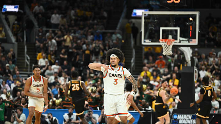 Mar 20, 2026; St. Louis, MO, USA; Miami (FL) Hurricanes guard Tre Donaldson (3) reacts after a play during the second half against the Missouri Tigers during a first round game of the men's 2026 NCAA Tournament at Enterprise Center. Mandatory Credit: Jeff Le-Imagn Images Mar 20, 2026; St. Louis, MO, USA; Miami (FL) Hurricanes guard Tre Donaldson (3) reacts after a play during the second half against the Missouri Tigers during a first round game of the men's 2026 NCAA Tournament at Enterprise Center. Mandatory Credit: Jeff Le-Imagn Images