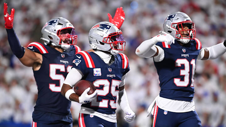 New England Patriots cornerback Marcus Jones (25) reacts after an interception against the Buffalo Bills during the second half at Highmark Stadium. Mandatory Credit: Mark Konezny-Imagn Images