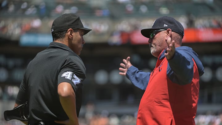Jun 7, 2025; San Francisco, California, USA;  Atlanta Braves manager Brian Snitker argues a call with umpire Gabe Morales (47) during the fifth inning of the game against the San Francisco Giants at Oracle Park. Mandatory Credit: Ed Szczepanski-Imagn Images