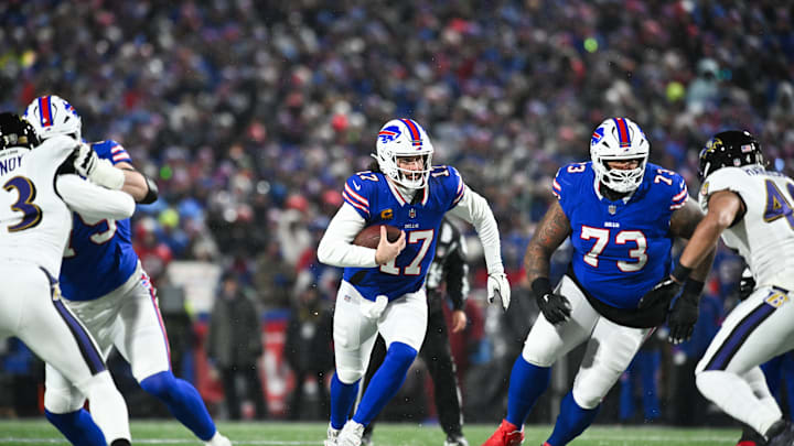 Jan 19, 2025; Orchard Park, New York, USA; Buffalo Bills quarterback Josh Allen (17) runs the ball during the first quarter against the Baltimore Ravens in a 2025 AFC divisional round game at Highmark Stadium