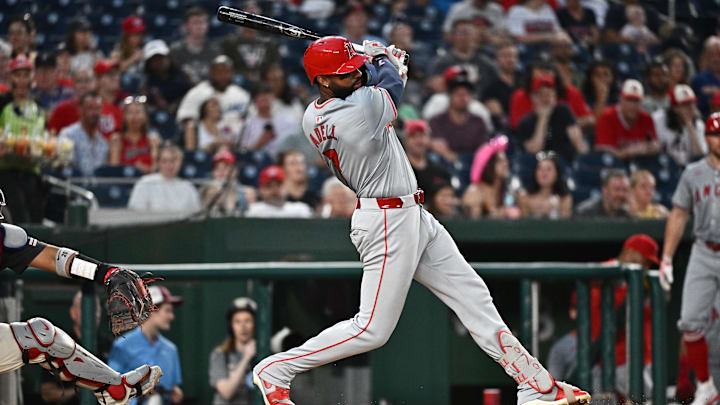 Aug 10, 2024; Washington, District of Columbia, USA; Los Angeles Angels right fielder Jo Adell (7) singles against the Washington Nationals during the fifth inning at Nationals Park. Mandatory Credit: James A. Pittman-Imagn Images Aug 10, 2024; Washington, District of Columbia, USA; Los Angeles Angels right fielder Jo Adell (7) singles against the Washington Nationals during the fifth inning at Nationals Park. Mandatory Credit: James A. Pittman-Imagn Images