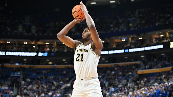 Mar 21, 2026; Buffalo, NY, USA; Michigan Wolverines forward Morez Johnson Jr. (21) shoots the ball in the second half against the Saint Louis Billikens during a second round game of the men's 2026 NCAA Tournament at Keybank Center. Mandatory Credit: Mark Konezny-Imagn Images