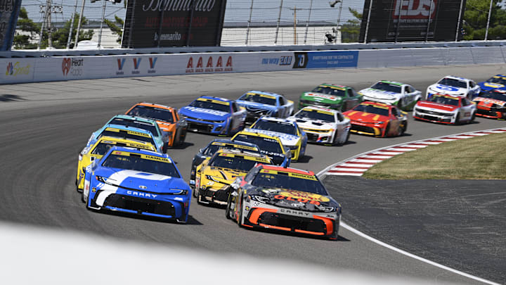 Sep 7, 2025; Madison, Illinois, USA; Drivers enter turn four during a re-start during the Enjoy Illinois 300 at World Wide Technology Raceway.